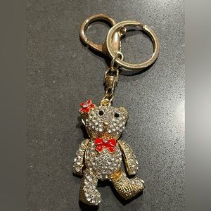 PURSE/BAG CHARM WITH KEY KEEPER. TEDDY BEAR, CLEAR & RED CRYSTALS. GOLD TONE
